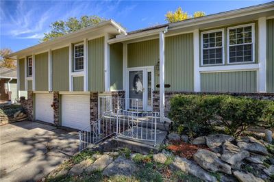 Property entrance with a garage | Image 3