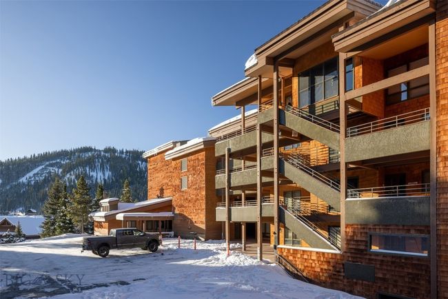 Snow covered property featuring a mountain view | Image 34