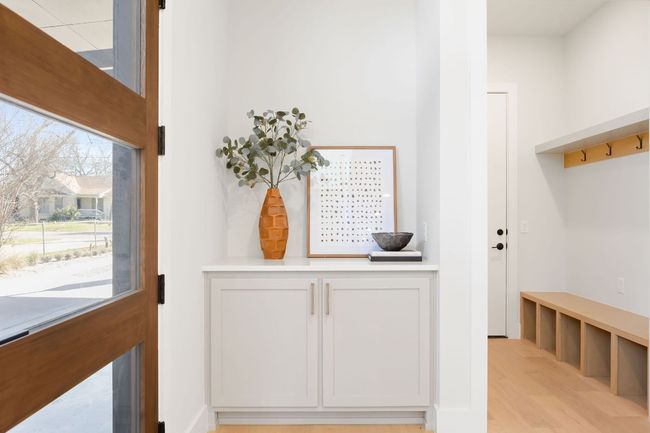 Mudroom with light wood finished floors | Image 8