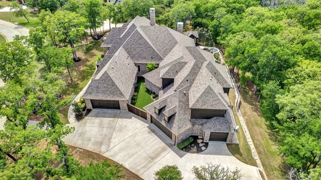 5 car garage! Two 2-car garages and one single car garage. A covered parking spot for everyone in your family! | Image 37
