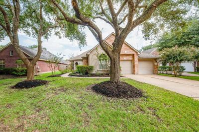 Curb appeal with mature trees | Image 2