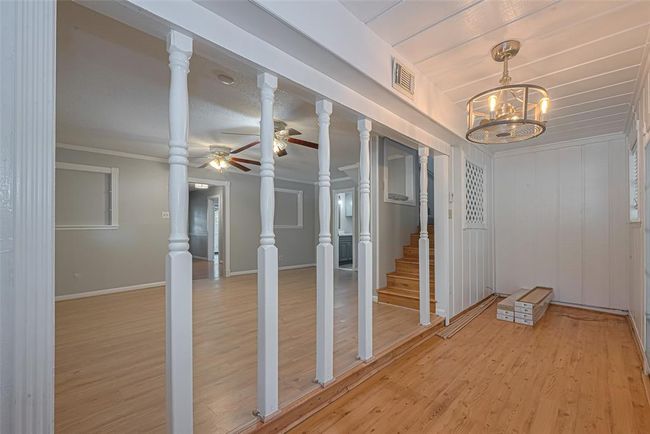 Inviting living area with decorations. | Image 10