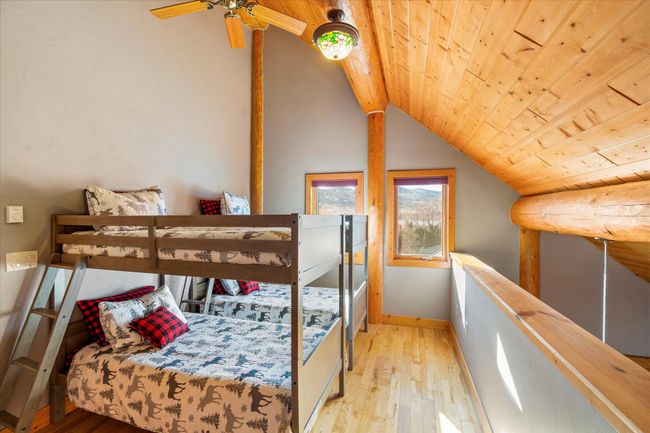 Upper level bunk room. | Image 57