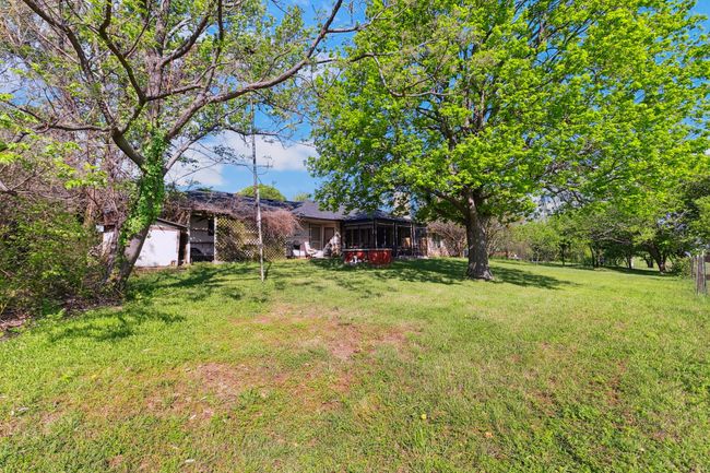 View of yard with a sunroom | Image 16
