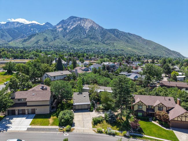 Aerial view of residential area with a mountainous background | Image 82