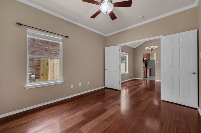 Three additional bedrooms offer flexibility for family, guests, or home office needs—the fourth bedroom is ideal as a study or workspace. | Image 22