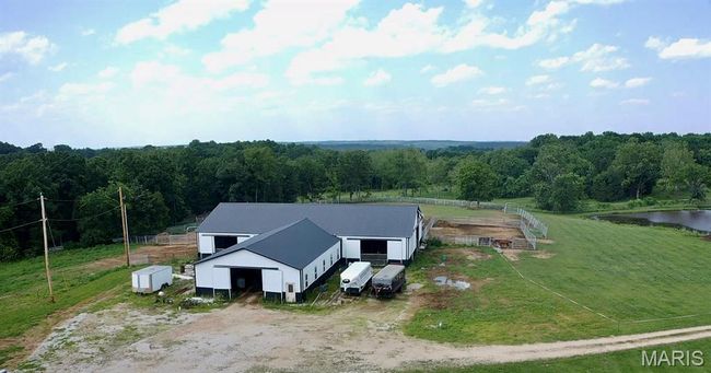 View from above of property with a forest | Image 4