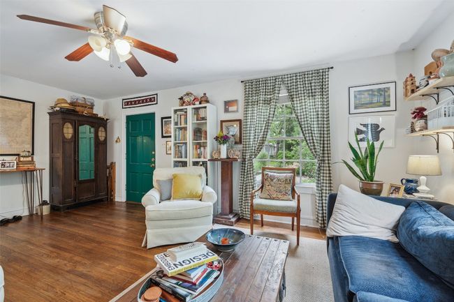 Main living area with original hardwood floors | Image 27