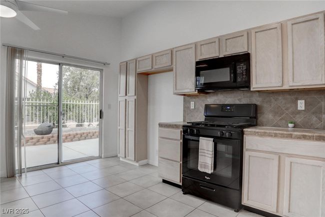 Kitchen featuring decorative backsplash | Image 15