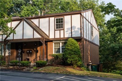 Welcome home to 33 Hiland Valley Drive in the heart of Ross Township! This three bedroom end unit on a quiet location in the neighbood is a rare to find gem. With a private rear common area and mauture trees. | Image 1