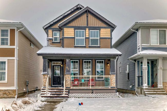 64 Evanscrest Place Nw, Home with 3 bedrooms, 2 bathrooms and 2 parking in Calgary AB | Image 1
