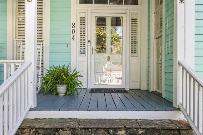 Idyllic front porch to display your plants, holiday decor, and perfect place to relax. | Image 27