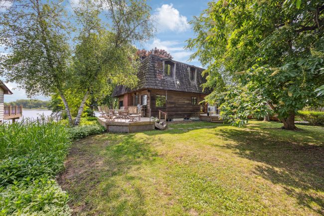 This shows the deck on the side of home overlooking the lake. | Image 27