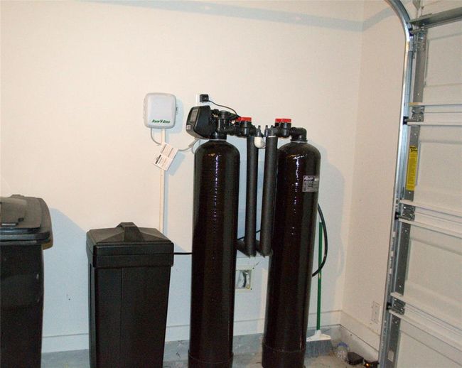 Whole house water softener comes with the home. | Image 23