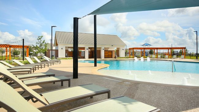 Community pool with a patio area | Image 10