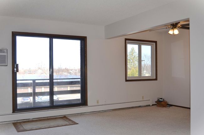 A211 Living Room & Dining Area With Lake Views | Image 10