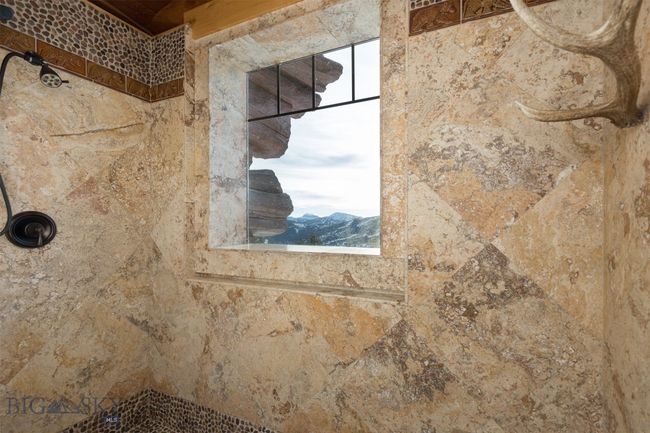Primary bathroom walk-in custom shower with mountain view. | Image 23