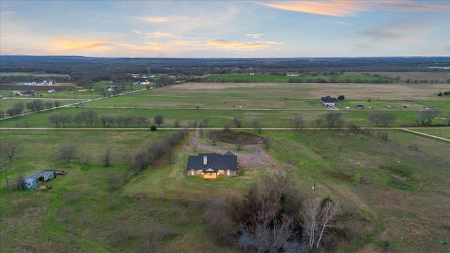 Aerial view at dusk featuring a rural view | Image 38