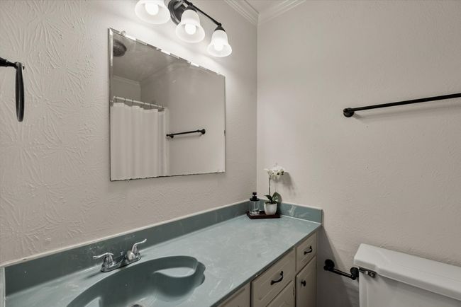 Bathroom with crown molding, vanity, and toilet | Image 20