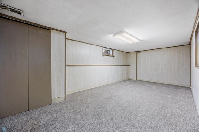 Family room in basement | Image 17