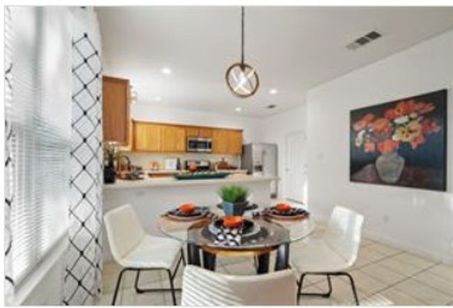 Dining room with light tile patterned floors, recessed lighting, visible vents, and baseboards | Image 7