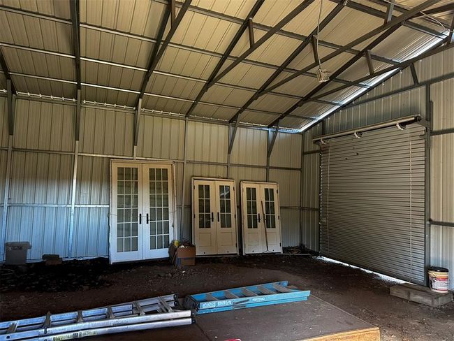 2 French doors for house and 1 for garage inside the Garage | Image 26