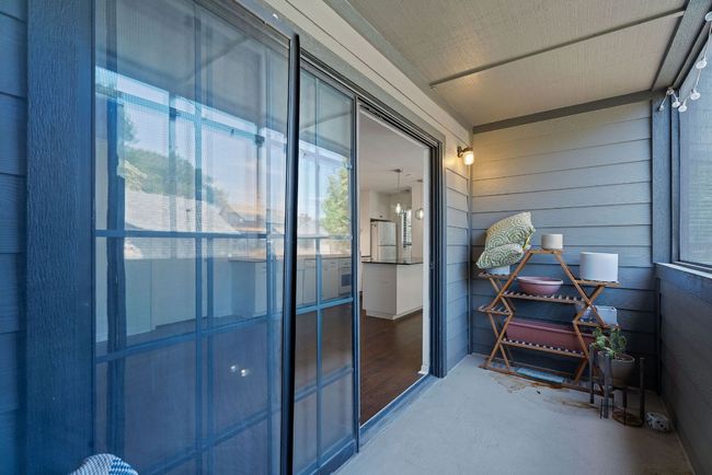 The balcony comes with a storage closet and plenty of space to configure your outdoor living space. | Image 25