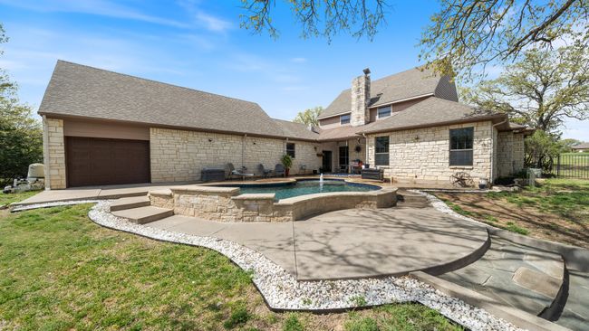 View of pool featuring fence, a fenced in pool, a yard, and a patio area | Image 34