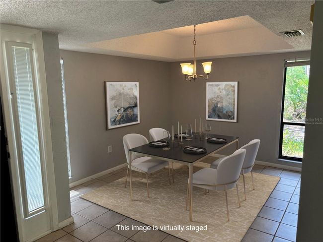 Virtually staged dining room | Image 11