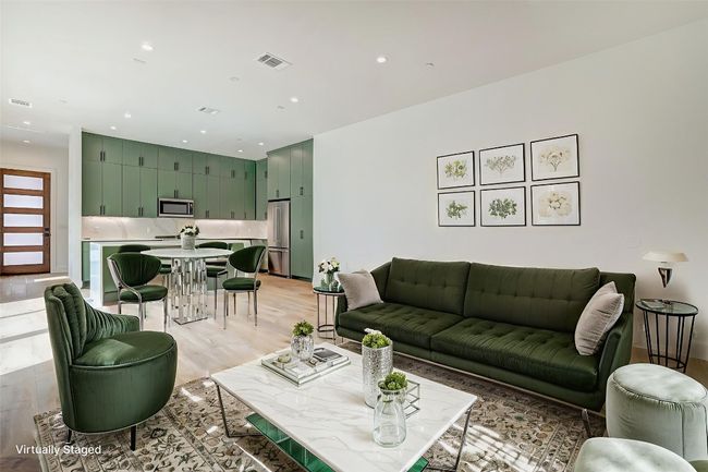 Living room featuring light wood finished floors and recessed lighting | Image 4