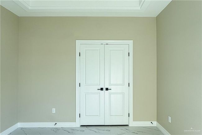 Empty room with marble finish floor and baseboards | Image 35