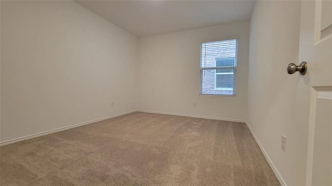 Carpeted spare room featuring baseboards | Image 14