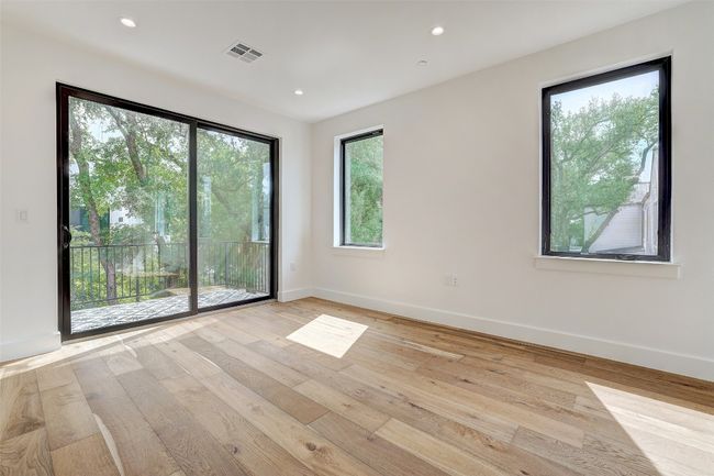 Unfurnished room featuring light wood-style floors and recessed lighting | Image 20