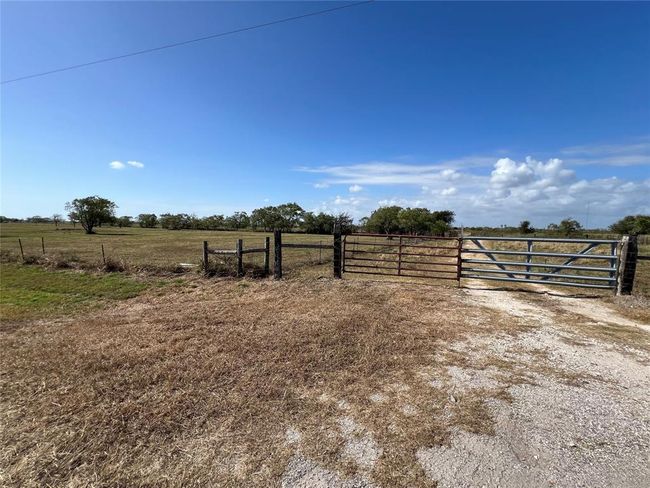 This is the far-right front corner of the property, and this is Butler Street, the property has over 213 Linear feet of frontage on Butler street as well! | Image 9