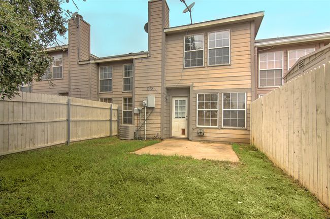 Back of property featuring a yard and a patio area | Image 23
