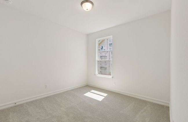 Comfortable secondary bedroom with generous closet space *Real home pictured | Image 5