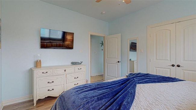 Alternative view of the primary bedroom. All TV's in home are smart TV's. Extra tempurpedic rollaway bed in owners closet. | Image 21