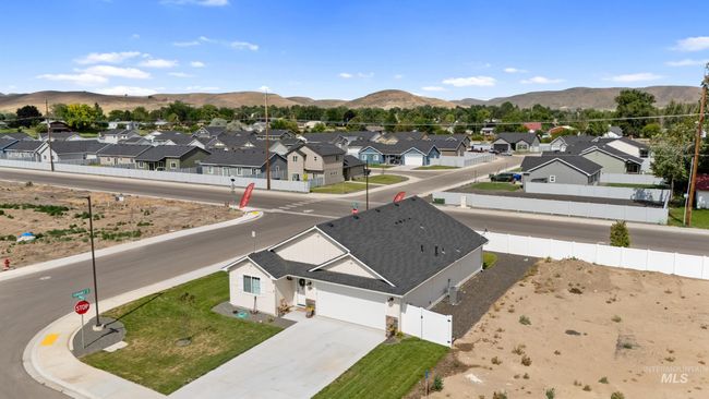 Aerial view of residential area with a mountainous background | Image 26