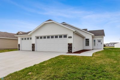 Welcome to 2044 62nd Ave S Fargo! 3 Bedrooms + Office/Den + Sun Room | Image 1