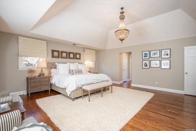 Primary Bedroom with Vaulted Ceiling | Image 23