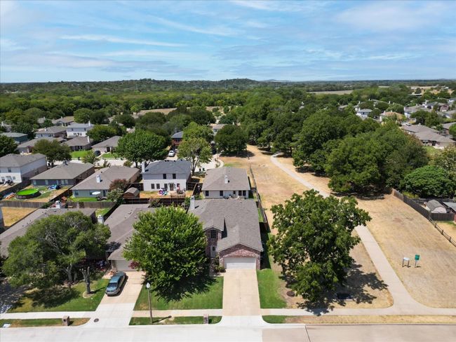 Aerial view of home with walking path | Image 39