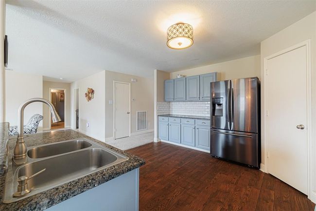Another view of the kitchen. | Image 8