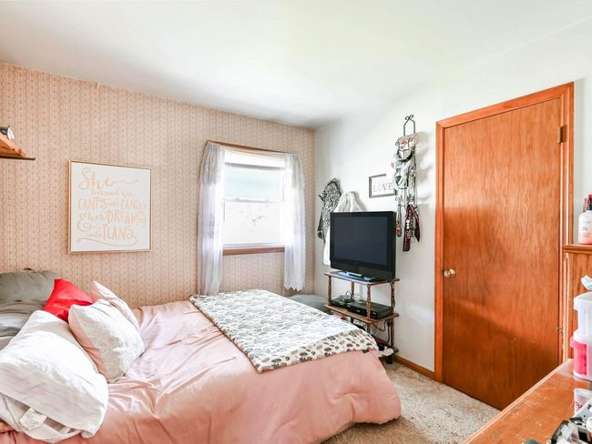 View of carpeted bedroom | Image 9