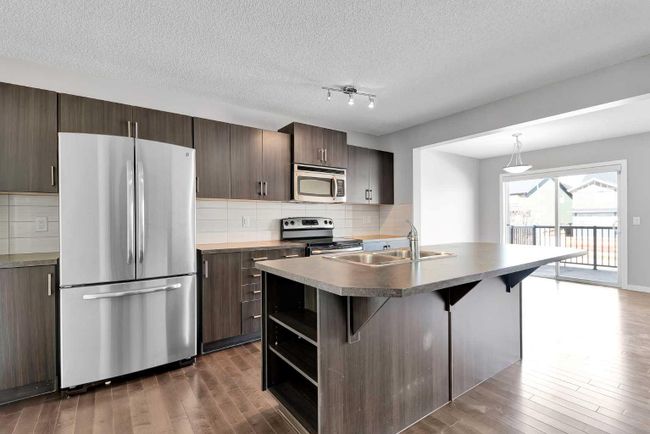 117 Sunset Common, Home with 3 bedrooms, 2 bathrooms and 2 parking in Cochrane AB | Image 3