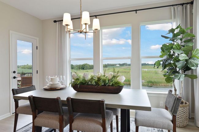 Dining room with windows!-model home | Image 12