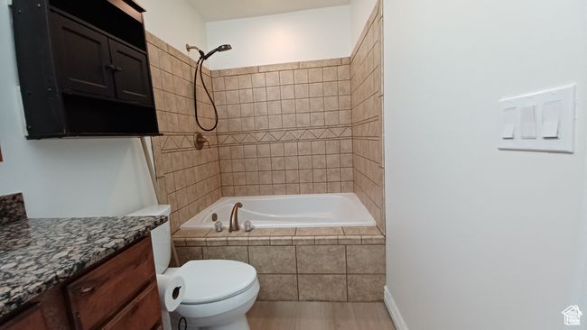 Full bath with vanity and tiled shower / bath combo | Image 19