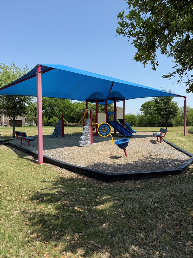 Community jungle gym with a lawn | Image 21