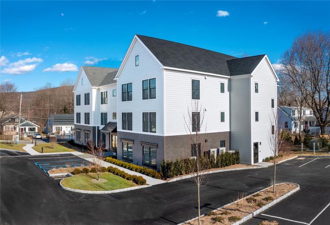 Convenient side door entrance and an expansive parking lot. | Image 41