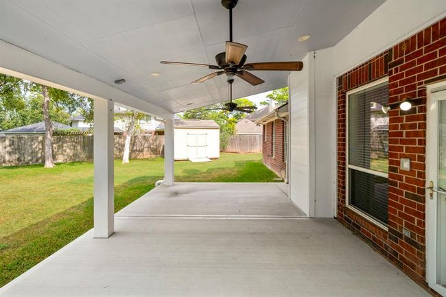 As a bonus, this home offers outside living space with this generous covered patio. | Image 35