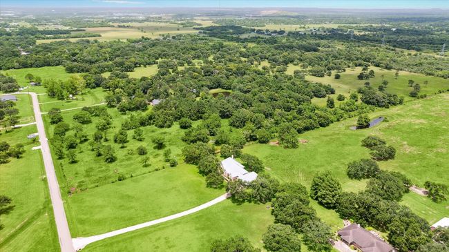 Peaceful rural feel oasis with easy access and amenities nearby. View from the front right side of the property. | Image 4